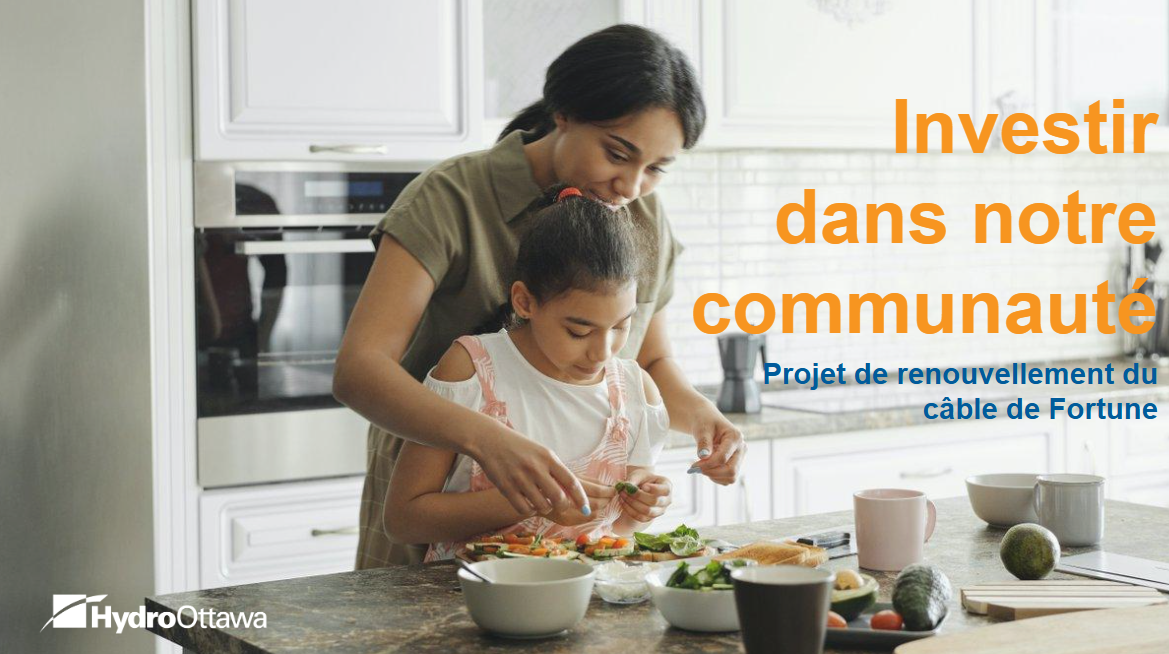 image showing a young child and their mother in the kitchen.