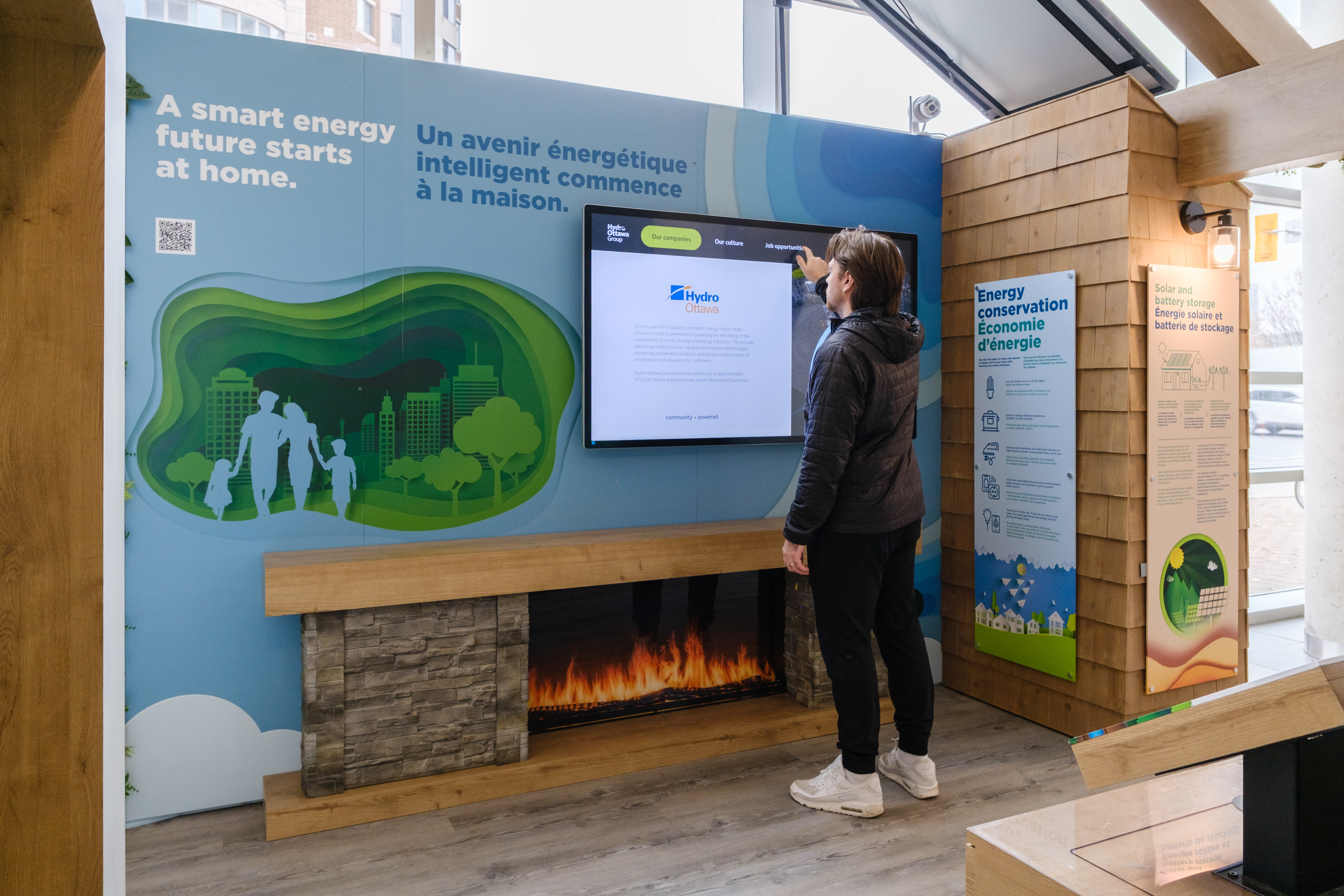 A customer visits Hydro Ottawa's Eco Home