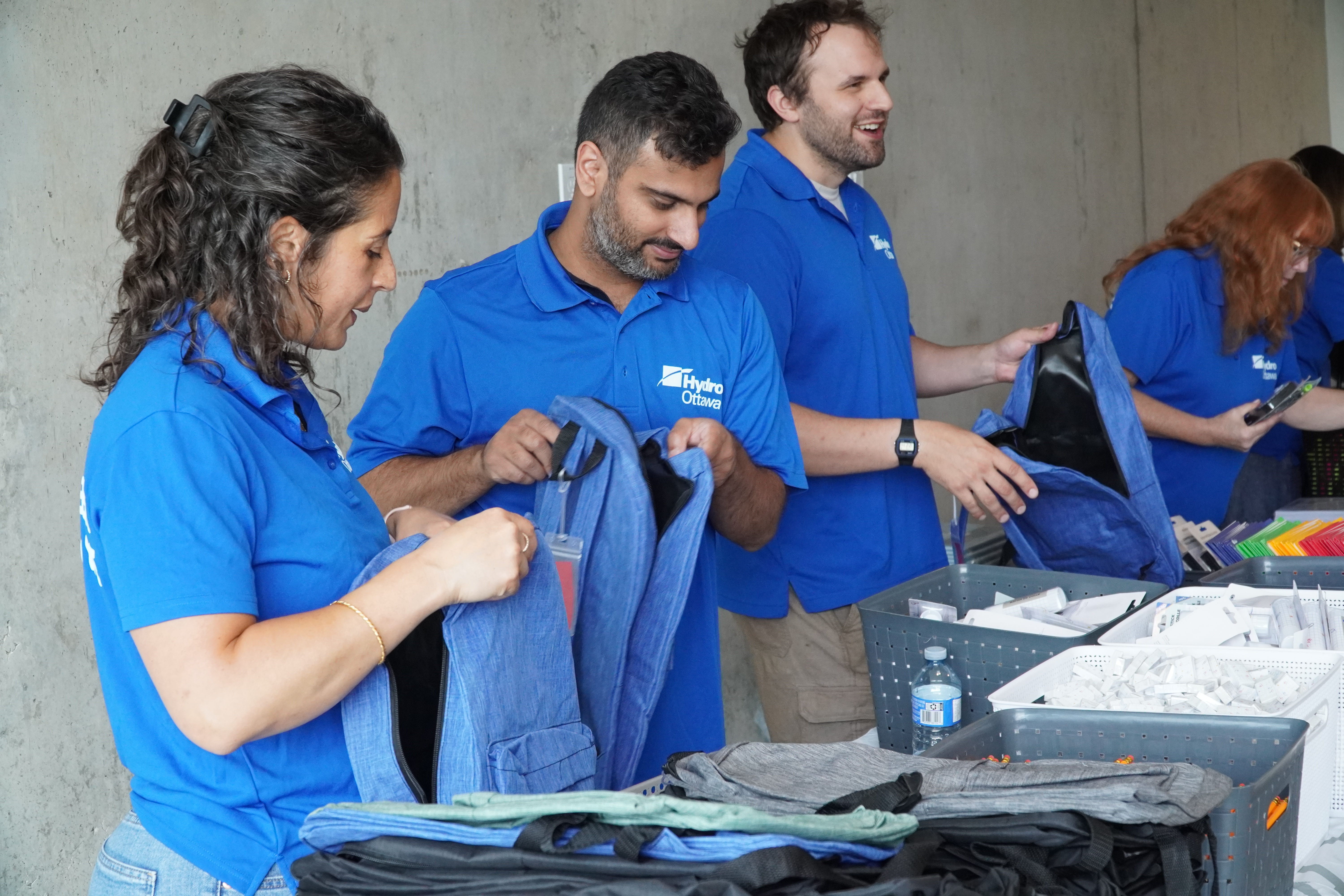 Hydro Ottawa employees volunteer at the Ottawa Community Housing Foundation Pack-a-Sack event