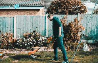 man-cutting-grass