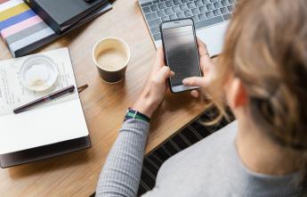 Woman working on cellphone