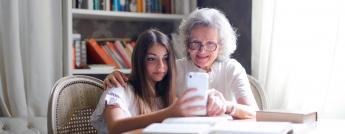 old-and-young-woman-using-cellphone