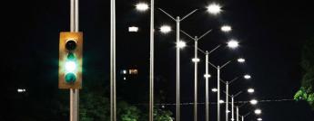 Traffic light with streetlights in the background